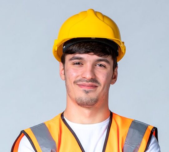 front-view-male-builder-uniform-yellow-helmet-white-wall front-view-male-builder-uniform-yellow-helmet-white-wall